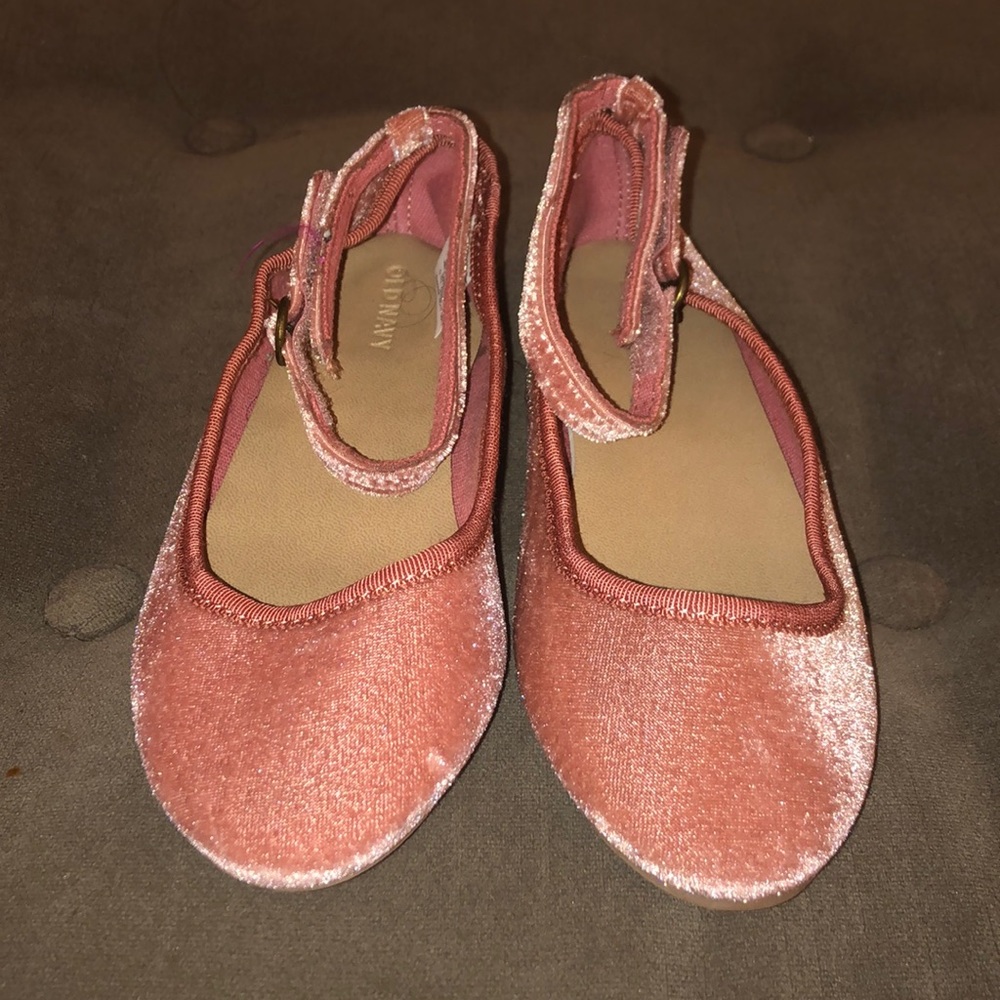 Girls flats with ankle strap.